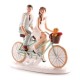Couple mariés à vélo profil 2